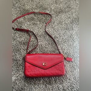 🍎COACH
Wyn Signature Leather Crossbody Bag